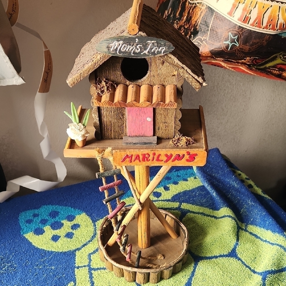 Rustic Wooden Birdhouse with Red Accents